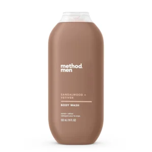 A bottle of Method Men Sandalwood and Vetiver body wash that is cruelty-free, biodegradable, and phthalate-free.