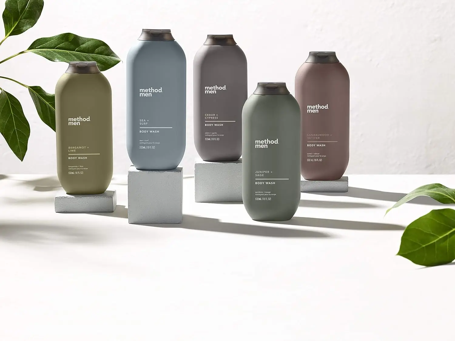 A bottle of Method Men Sandalwood and Vetiver body wash that is cruelty-free, biodegradable, and phthalate-free.