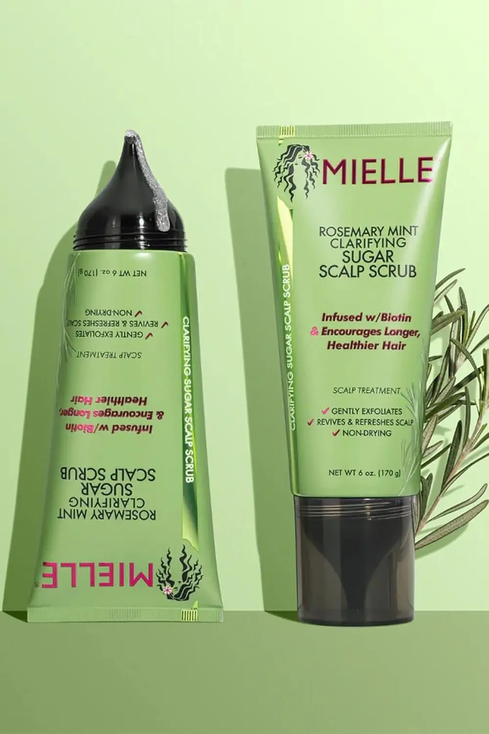 Mielle Rosemary Mint scalp scrub pre-shampoo treatment exfoliates to remove buildup and oil, leaving the scalp refreshed.