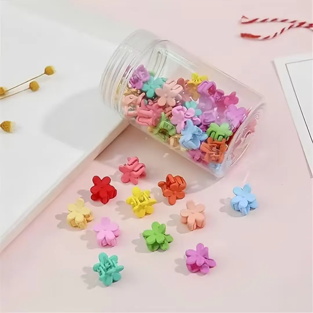 This set of 40 colorful mini flower hair clips are made of resin, perfect for creating stylish hairstyles for baby girls, toddlers, and women with thin or fine hair.
