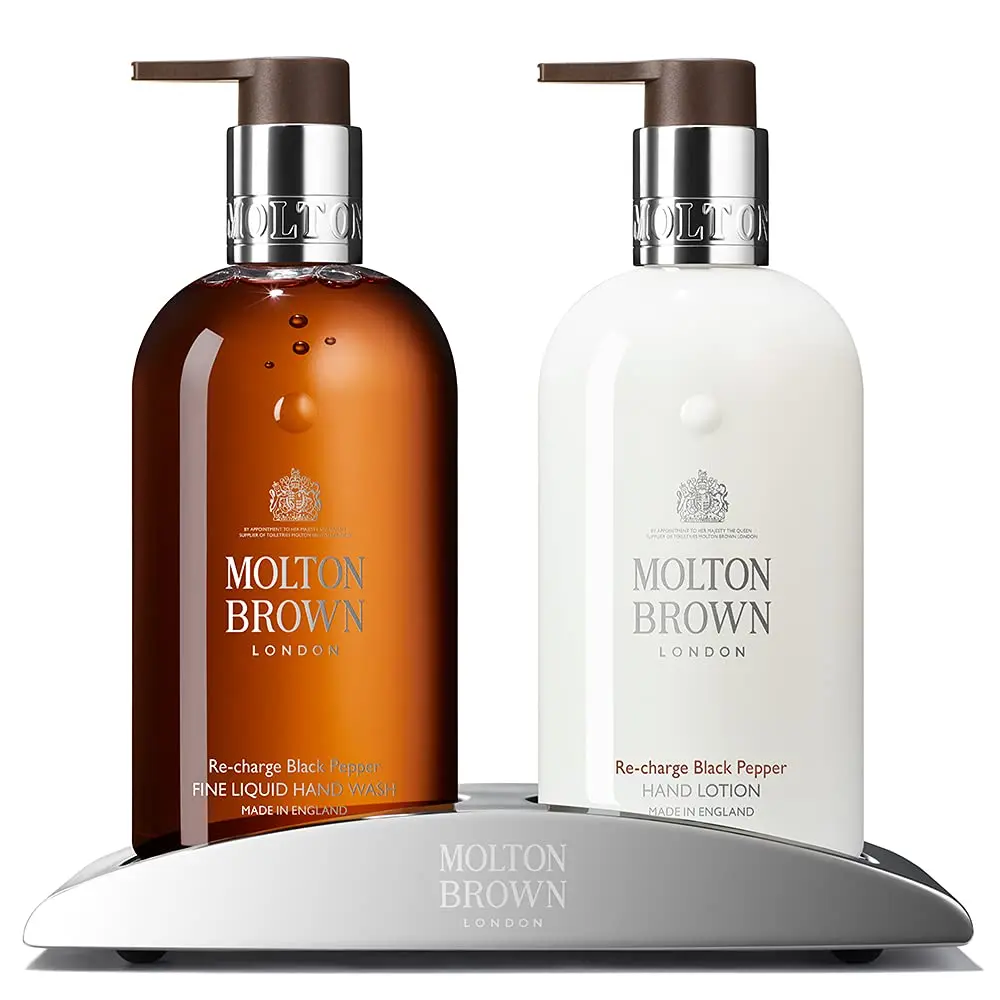 Sleek stainless steel Molton Brown Elemental Arc hand wash holder designed to elegantly display hand wash and lotion bottles in your bathroom or kitchen.
