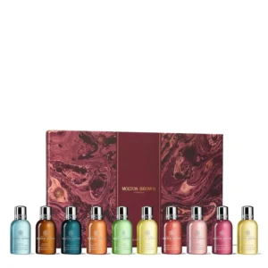 Molton Brown stocking filler gift set containing ten 50ml luxury bath and shower gels with a range of iconic scents, presented in festive limited edition packaging inspired by their original 1970s salon.