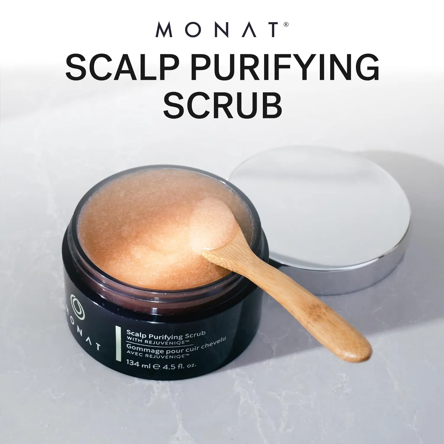 MONAT scalp scrub with Rejuveniqe deeply cleanses and purifies the scalp, removing dead skin cells and restoring balance for fresh, healthy hair.