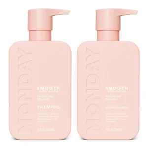 MONDAY Haircare Smooth shampoo and conditioner set designed for frizzy, curly, and coarse hair, featuring recyclable pink bottles.