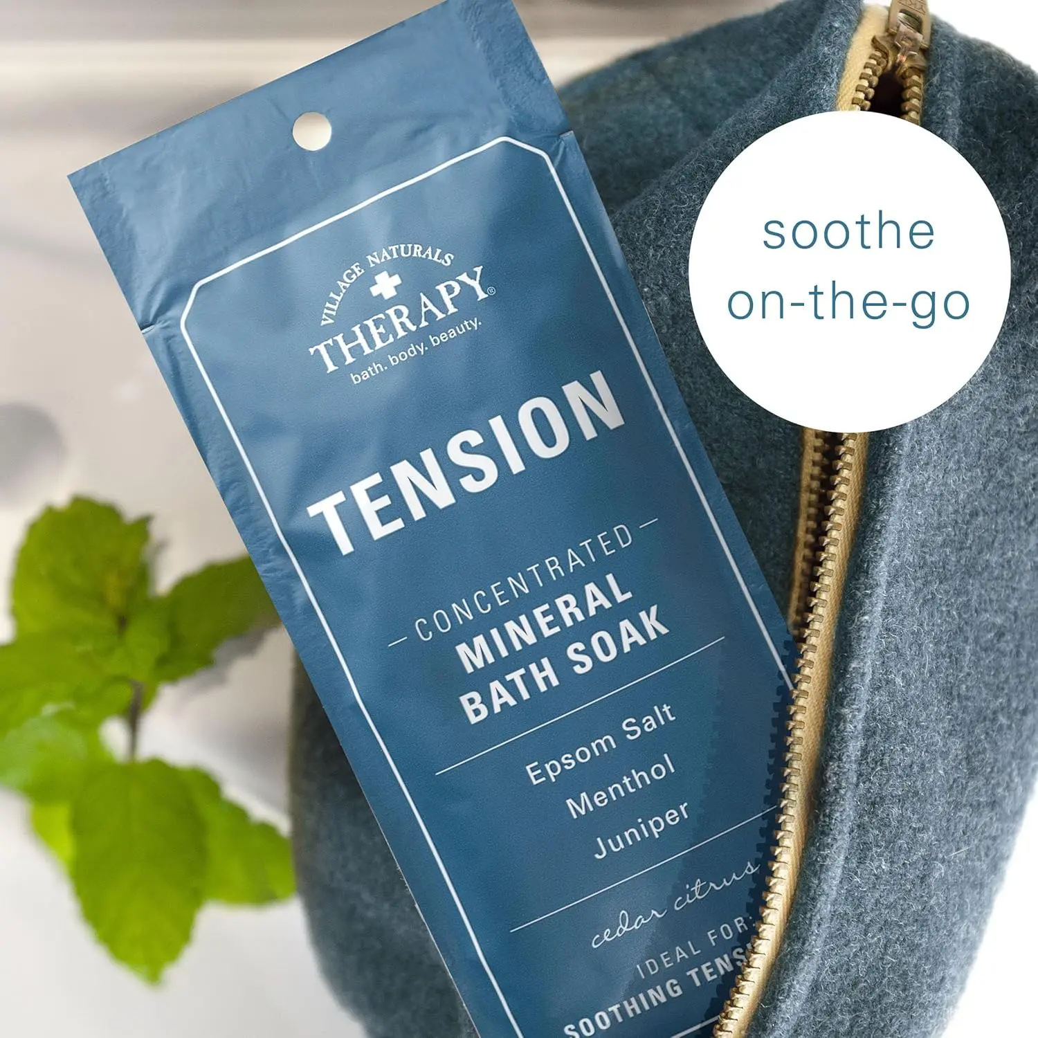 Twelve single-use packets of Village Naturals Therapy Aches & Pains Tension Relief Mineral Bath Soak with Juniper, Orange and Menthol, for on-the-go muscle relaxation.