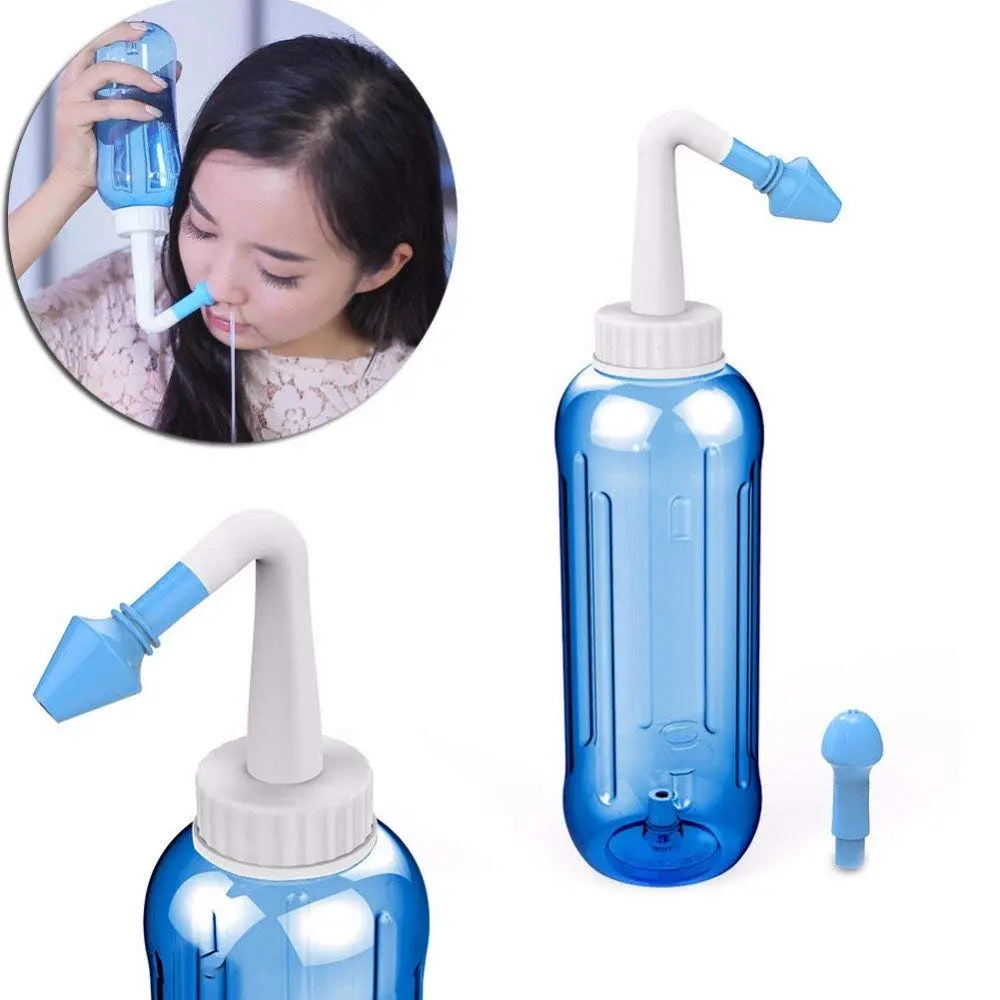 Blue 500ml nasal rinse kit with two nozzles for adults and children, designed to relieve sinus allergies and provide gentle nasal cleaning.