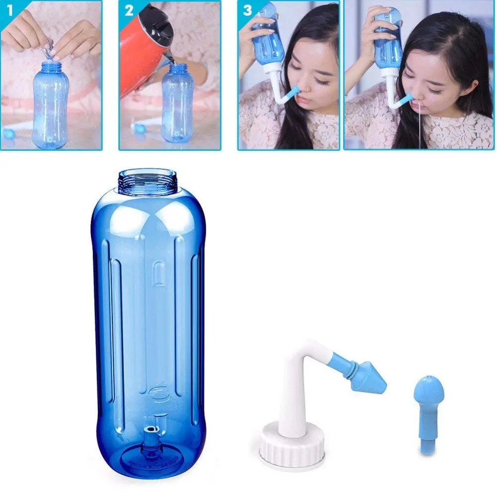 Blue 500ml nasal rinse kit with two nozzles for adults and children, designed to relieve sinus allergies and provide gentle nasal cleaning.