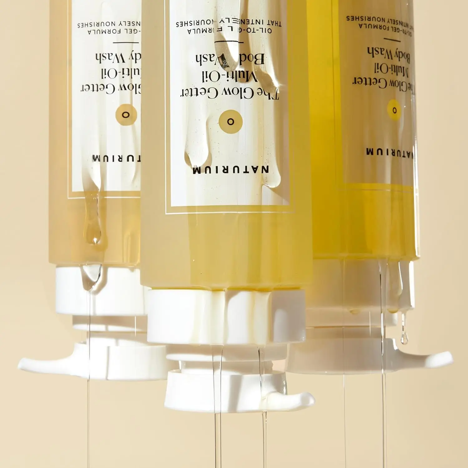 Naturium The Glow Getter Multi-Oil Hydrating Body Wash gently cleanses and nourishes skin with a vegan, dermatologist-tested formula for all skin types.