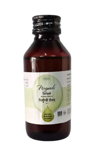 Three bottles of Nagarjun Nirgundi Tailam, an Ayurvedic oil indicated for vata disorders, sinusitis, and scrofula.