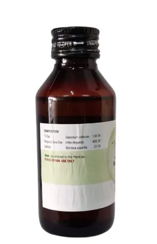 Three bottles of Nagarjun Nirgundi Tailam, an Ayurvedic oil indicated for vata disorders, sinusitis, and scrofula.