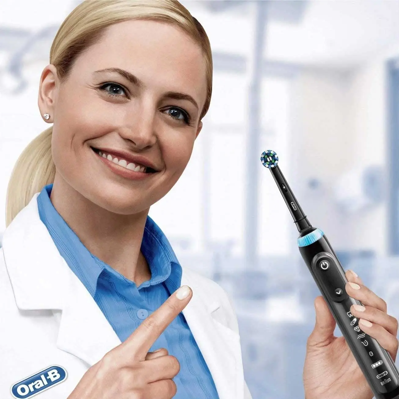 Four black Oral-B CrossAction replacement brush heads, designed with 16-degree angled bristles to remove plaque and whiten teeth, compatible with most Oral-B electric toothbrushes.