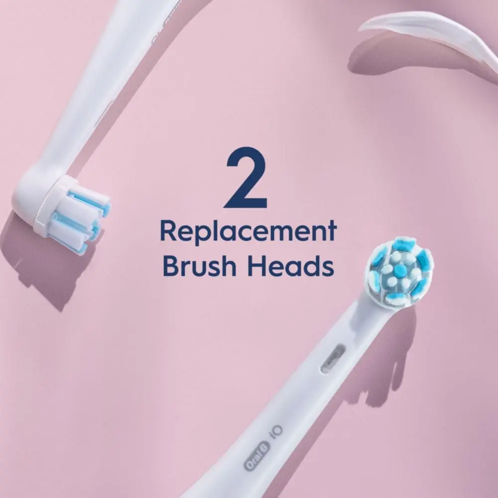 Two white Oral-B iO Gentle Care replacement brush heads with soft bristles, designed for gentle cleaning of teeth and gums with Oral-B iO electric toothbrushes.