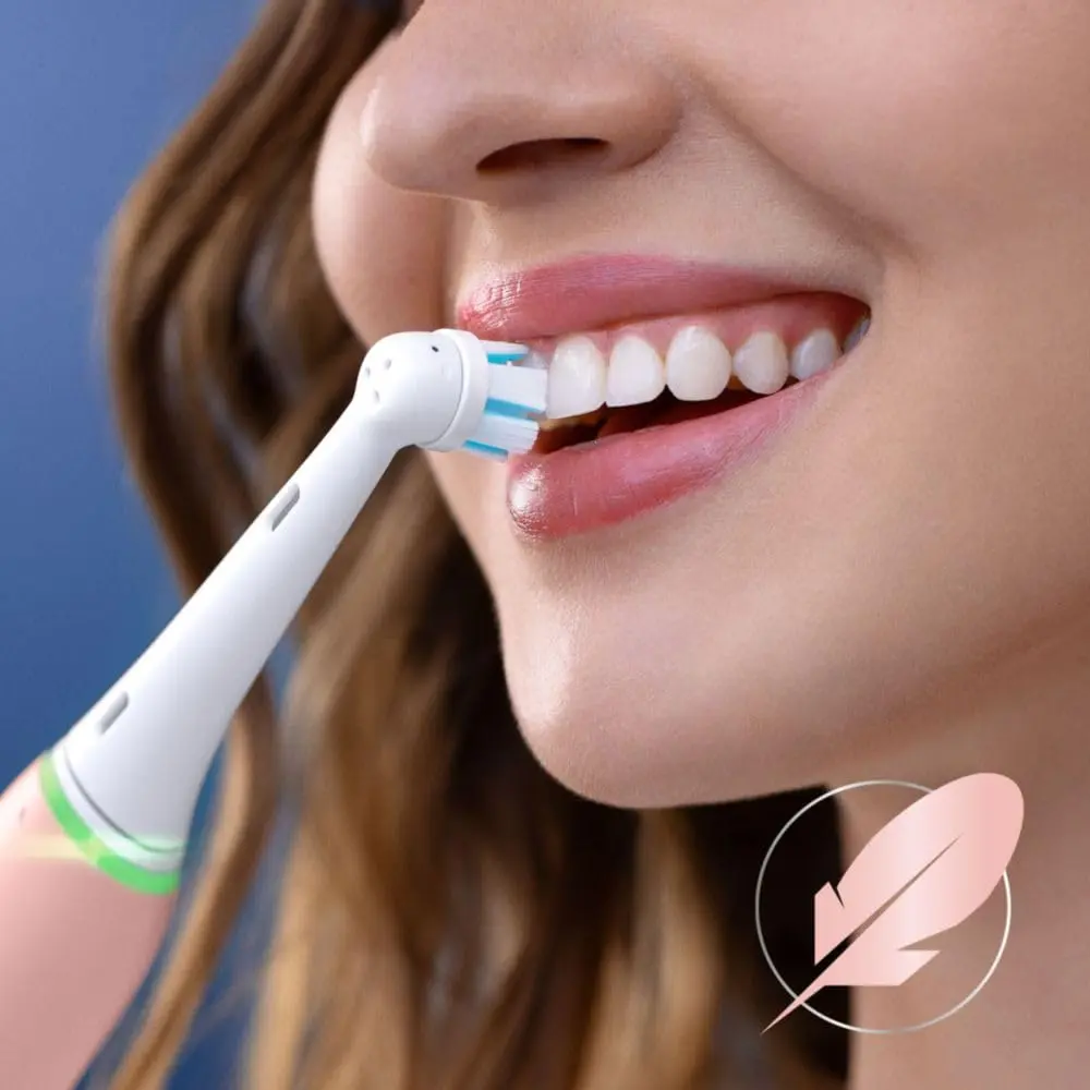 Two white Oral-B iO Gentle Care replacement brush heads with soft bristles, designed for gentle cleaning of teeth and gums with Oral-B iO electric toothbrushes.