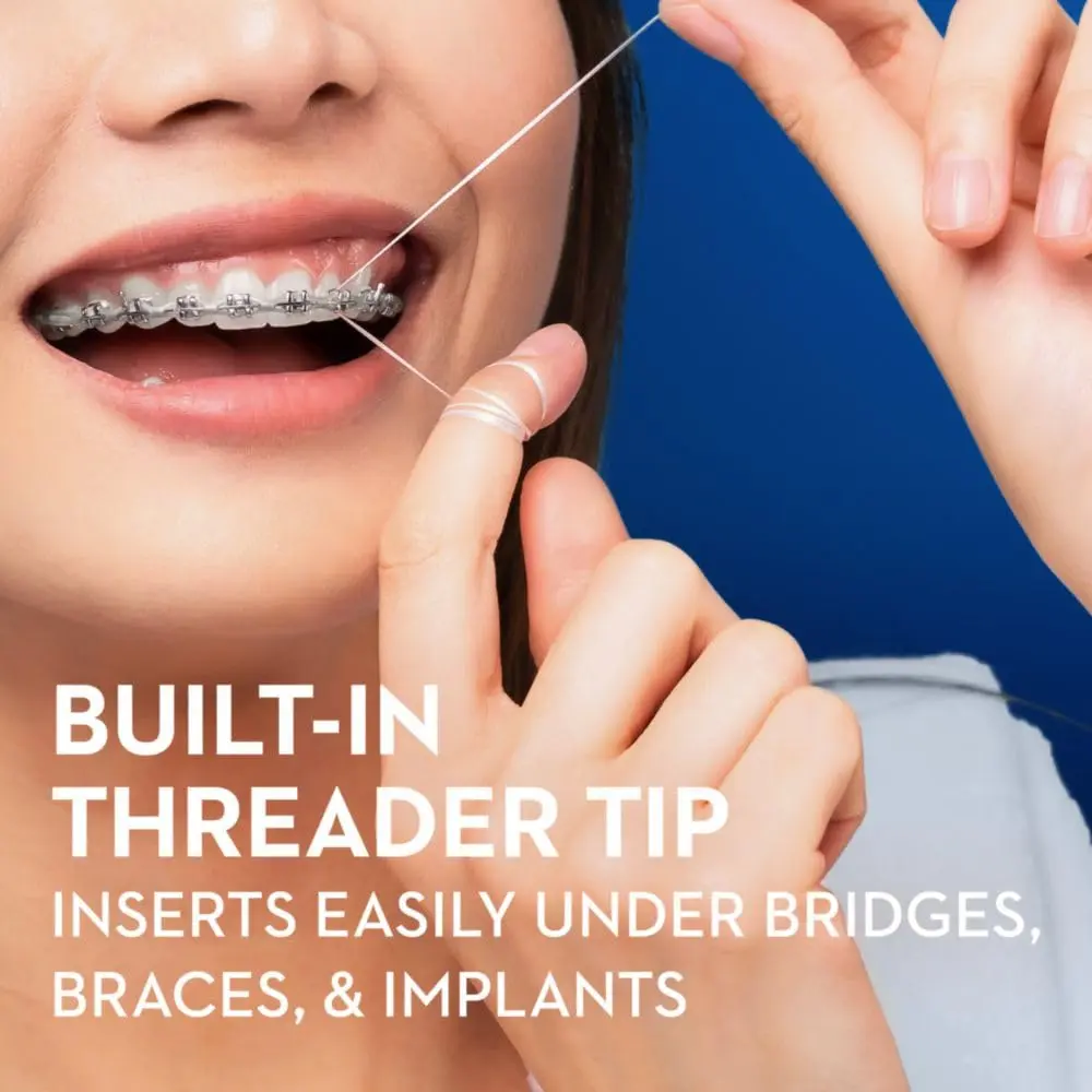 Single-use packets of Oral-B Glide floss threaders easily remove plaque between teeth, ideal for braces, bridges, and implants.