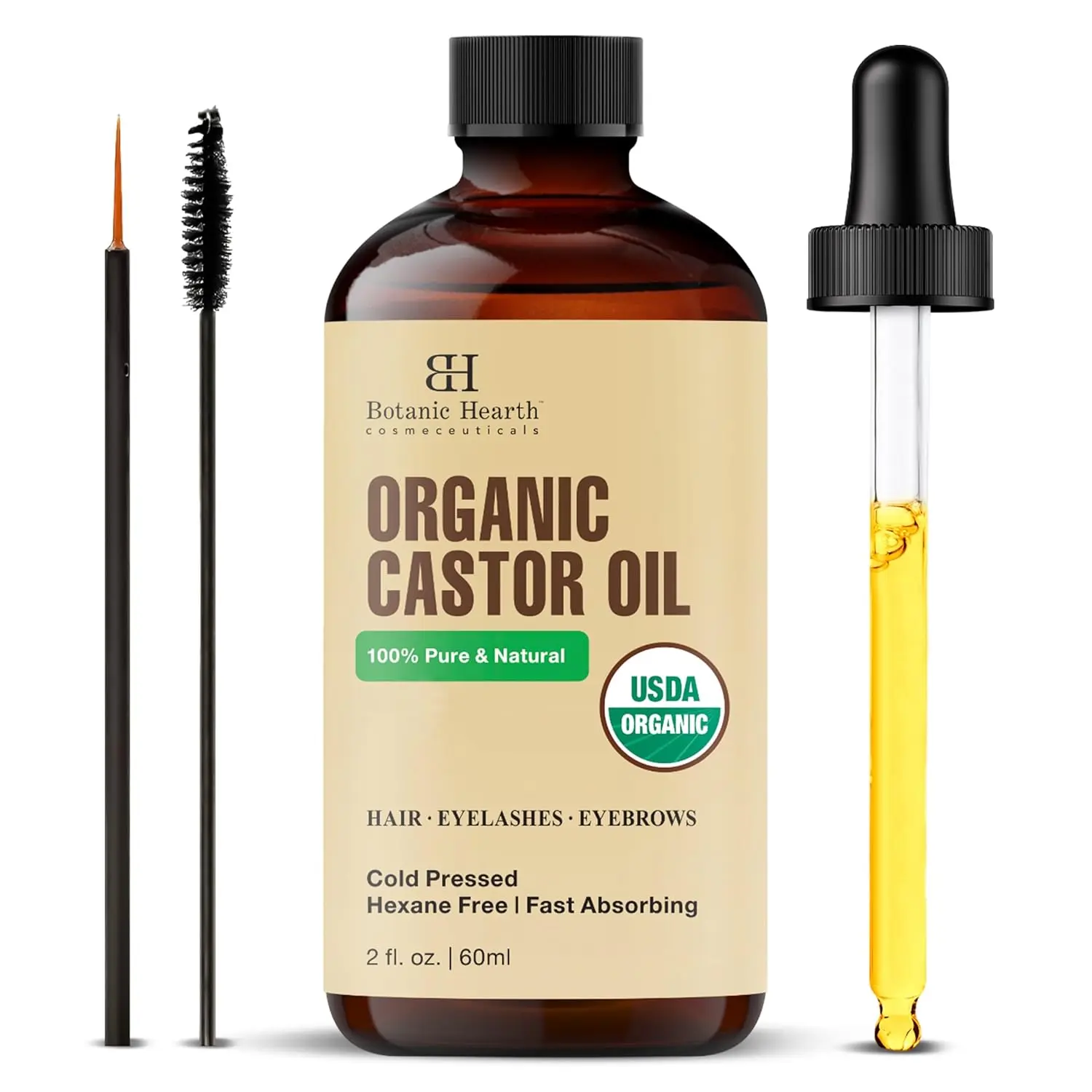 Botanic Hearth organic castor oil in a glass bottle with dropper and lash brushes, perfect for nourishing hair, eyelashes, and eyebrows, promoting healthy growth and shine.