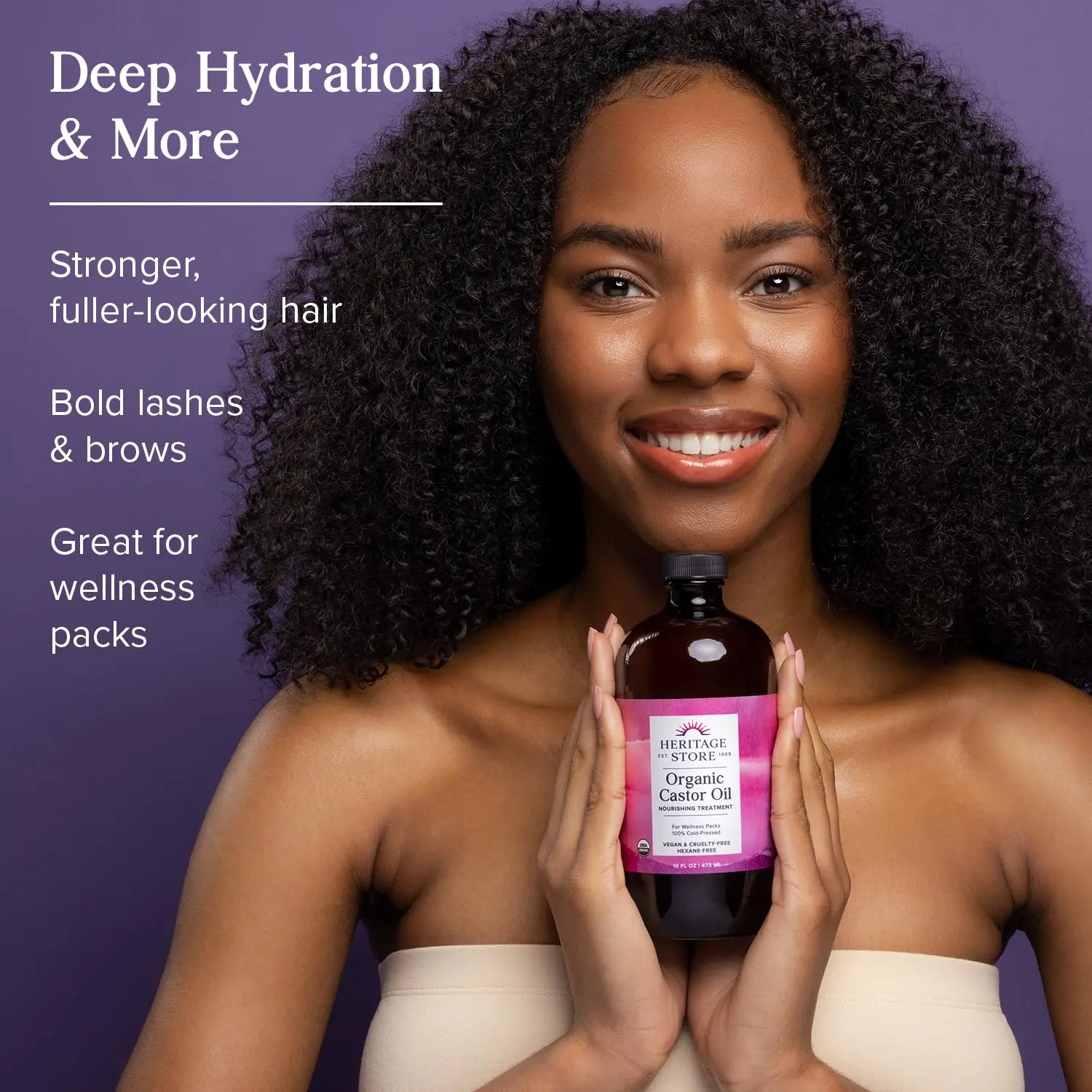 Heritage Store organic castor oil in a dark glass bottle, used for hair growth, eyebrow enhancement, and skin moisturizing, showcasing its pure and natural cold-pressed hexane-free formula.