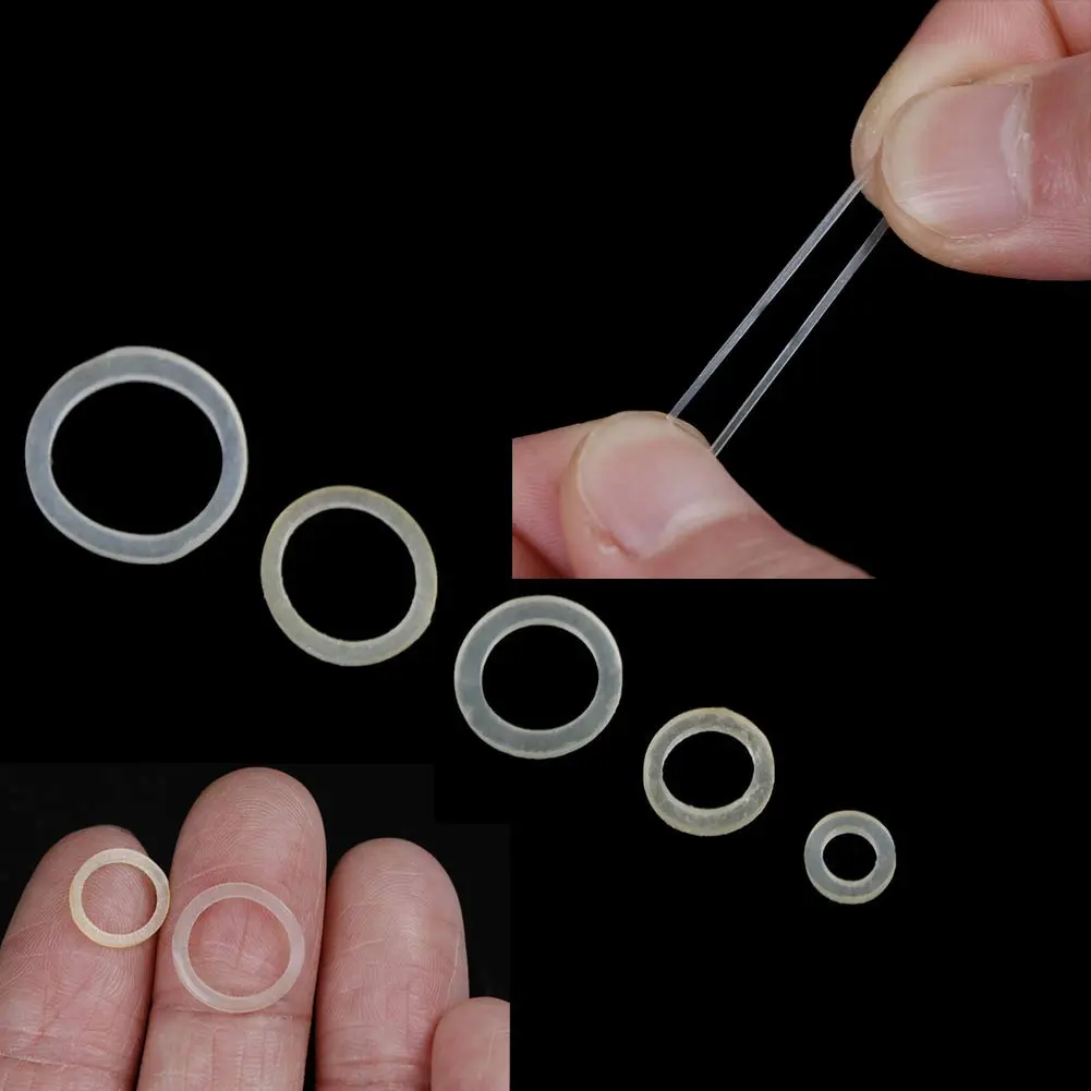 A close-up image showing a pack of 500 orthodontic elastic rubber bands designed for dental use, offering gentle and long-lasting traction with high elasticity and durability, made from safe, imported rubber materials.