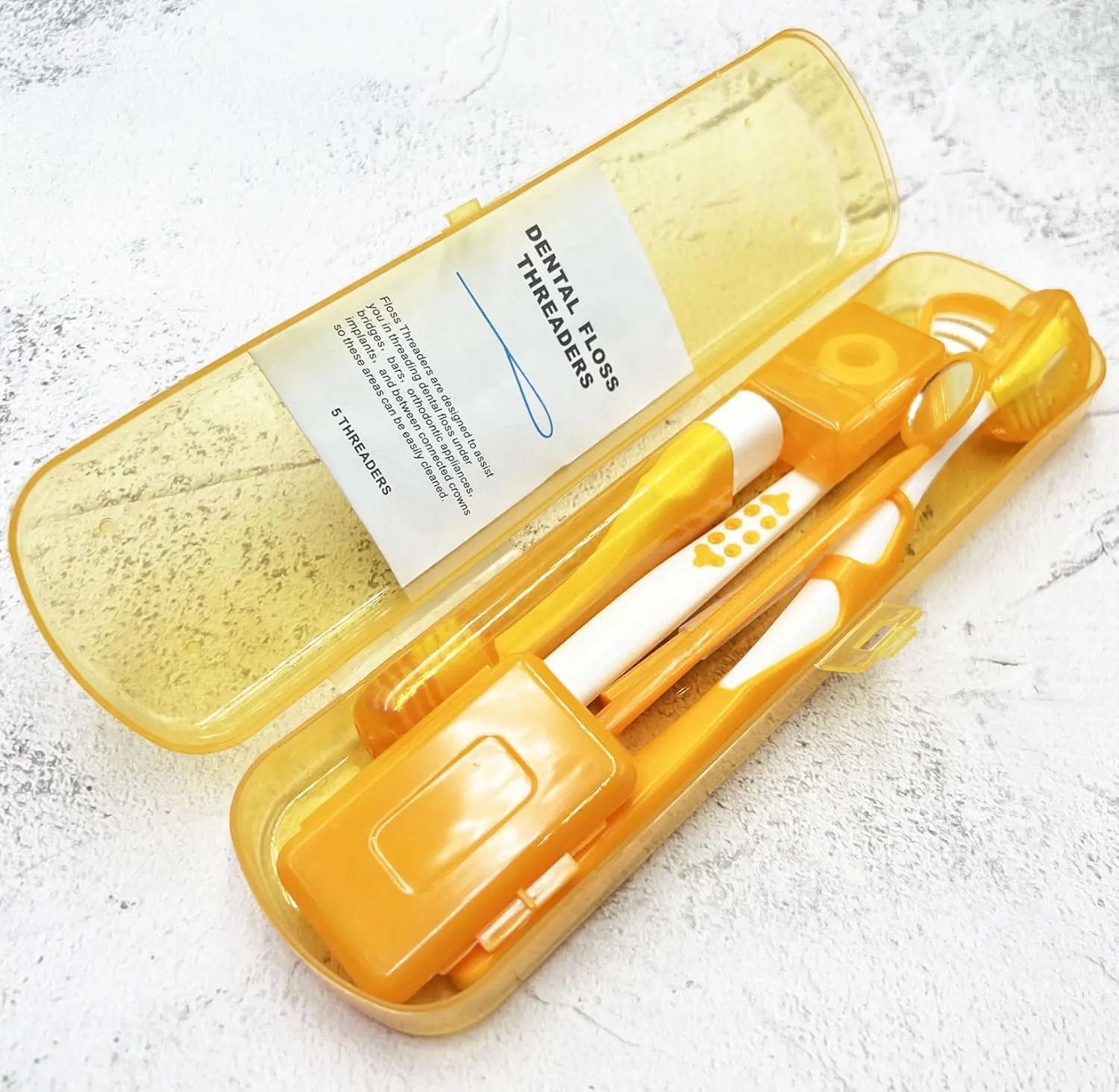 This portable orthodontic oral care kit includes a V-shape toothbrush, travel toothbrush, dental floss, mouth mirror, orthodontic wax, interdental brush, hourglass timer, and floss threaders for cleaning braces.