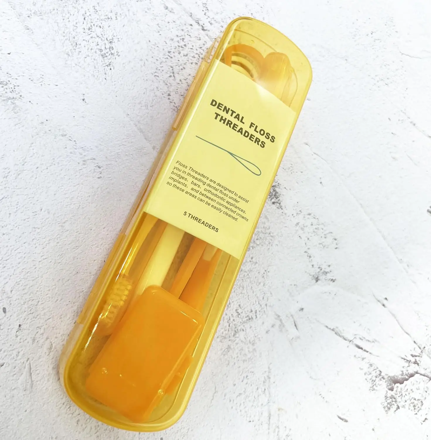 This portable orthodontic oral care kit includes a V-shape toothbrush, travel toothbrush, dental floss, mouth mirror, orthodontic wax, interdental brush, hourglass timer, and floss threaders for cleaning braces.