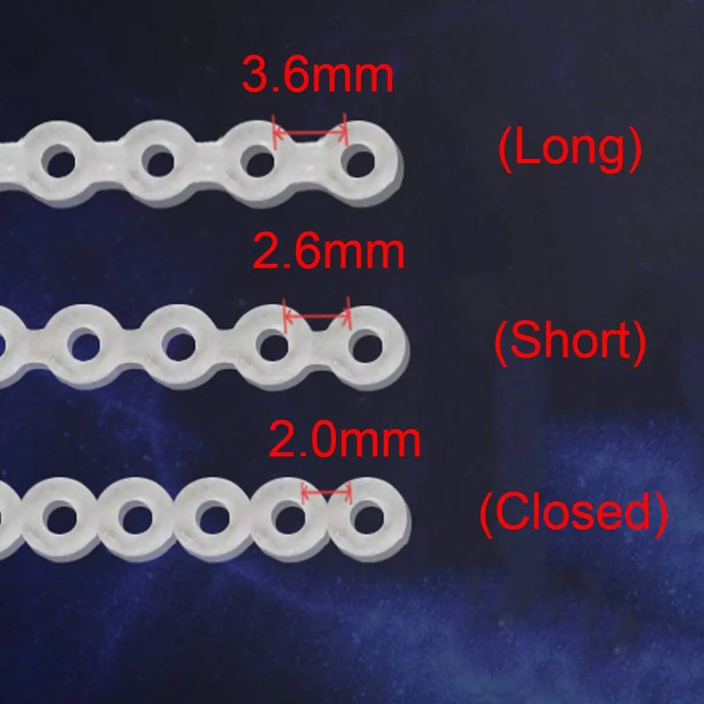 Spool of clear hypoallergenic dental power chains with superior elongation, designed for easy elastic placement in orthodontic braces with flexible and resilient rubber bands.