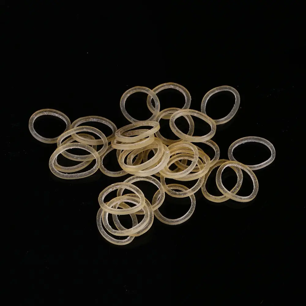 Ten bags of 3/8 inch clear orthodontic rubber bands, also suitable for dog grooming, doll hair, and crafts; however, contains latex.