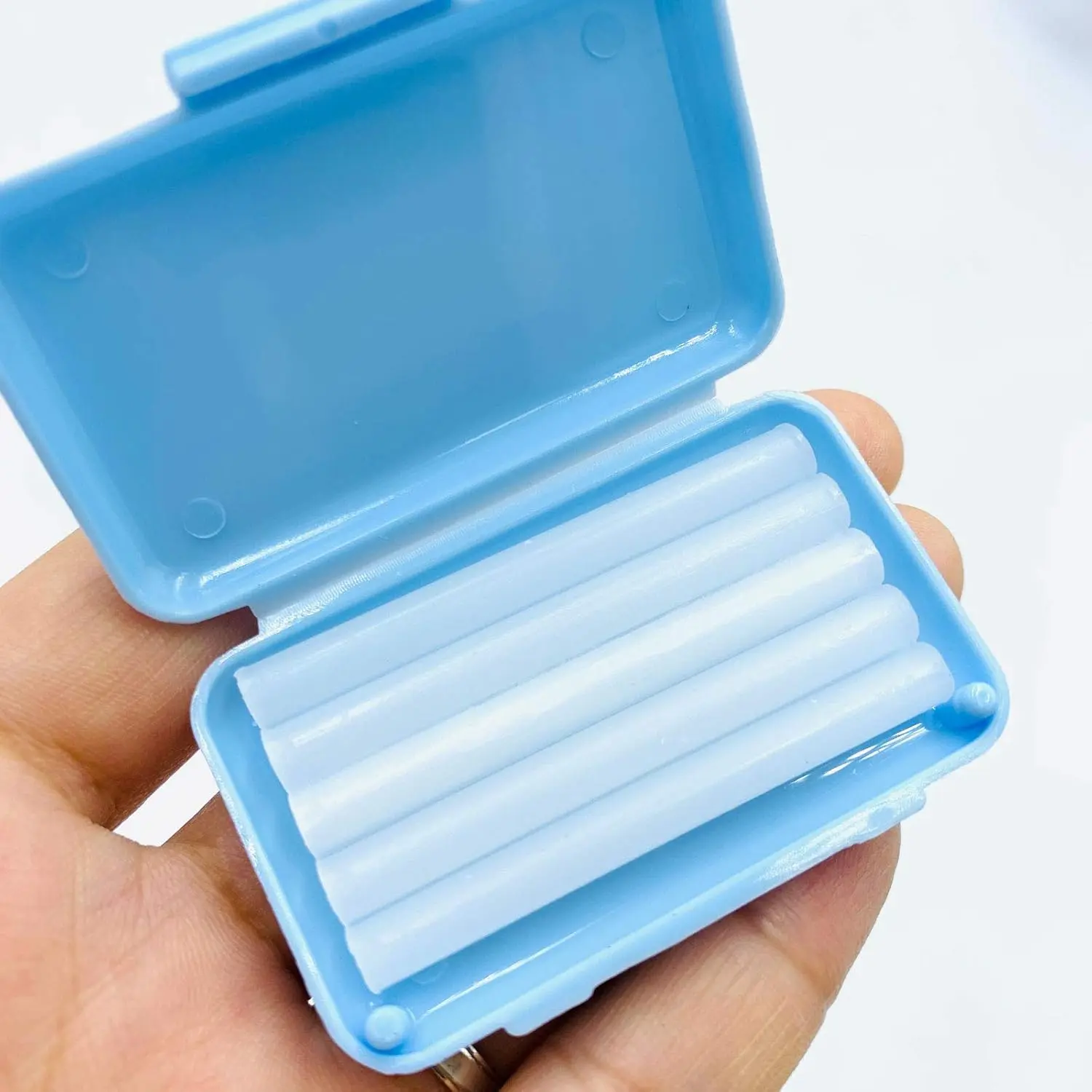 Ten boxes of clear orthodontic wax with mint scent offer temporary relief from braces irritation and gum protection.