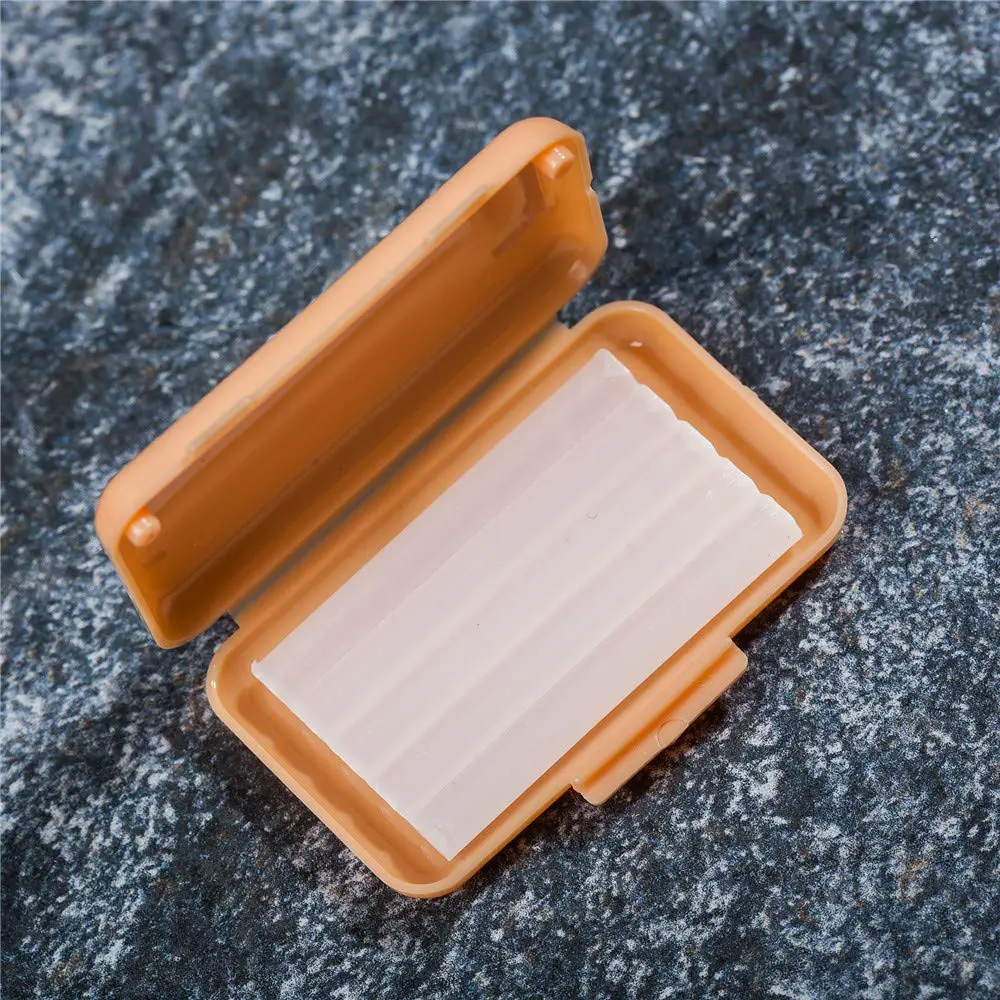 Ten boxes of flavored dental wax provide temporary relief from irritation caused by braces, wires, and springs, protecting gums.