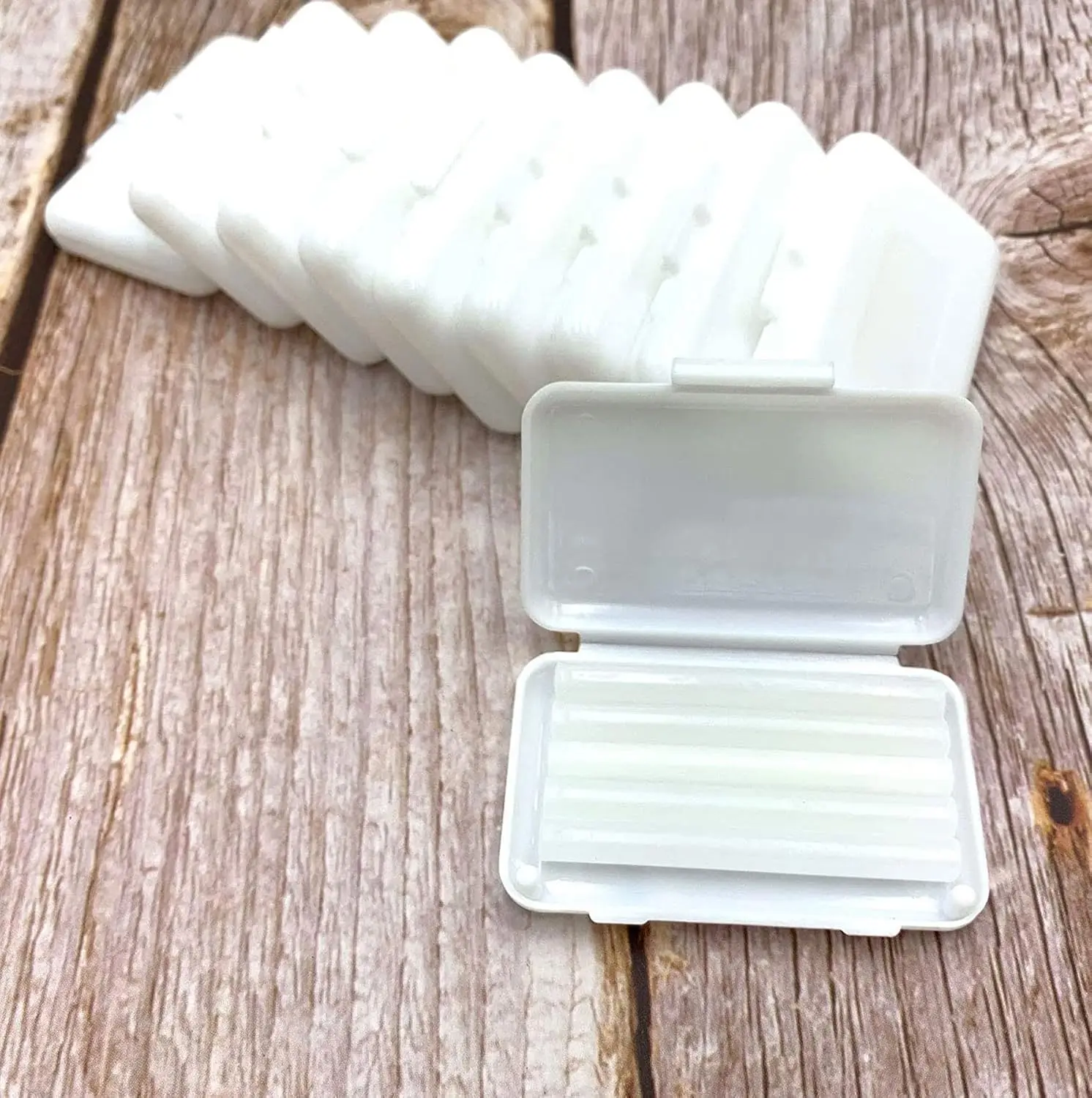 Ten packs of clear, tasteless dental orthodontic wax for braces providing temporary relief from irritation and gum protection.