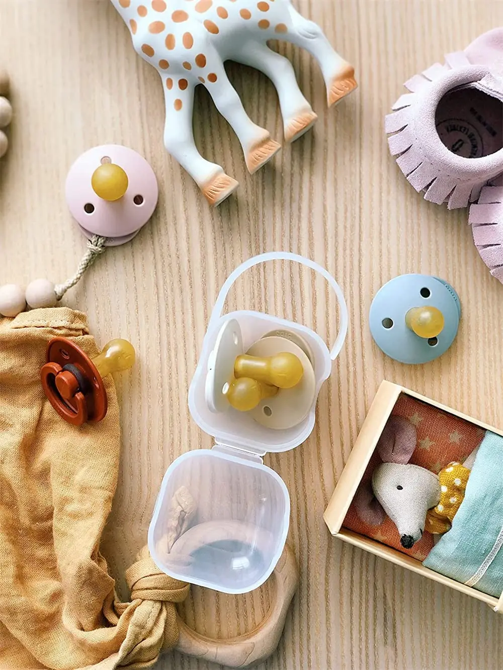 This three pack of BPA-free pacifier cases keeps your baby's pacifiers clean and easily accessible while on the go, protecting them from dust and dirt.