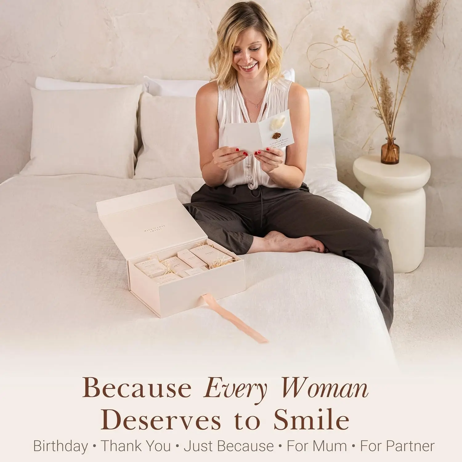 This luxury spa gift set is the perfect pamper gift for women who need self-care and relaxation, featuring a soy wax candle, body scrub, bath salts, and other premium essentials.