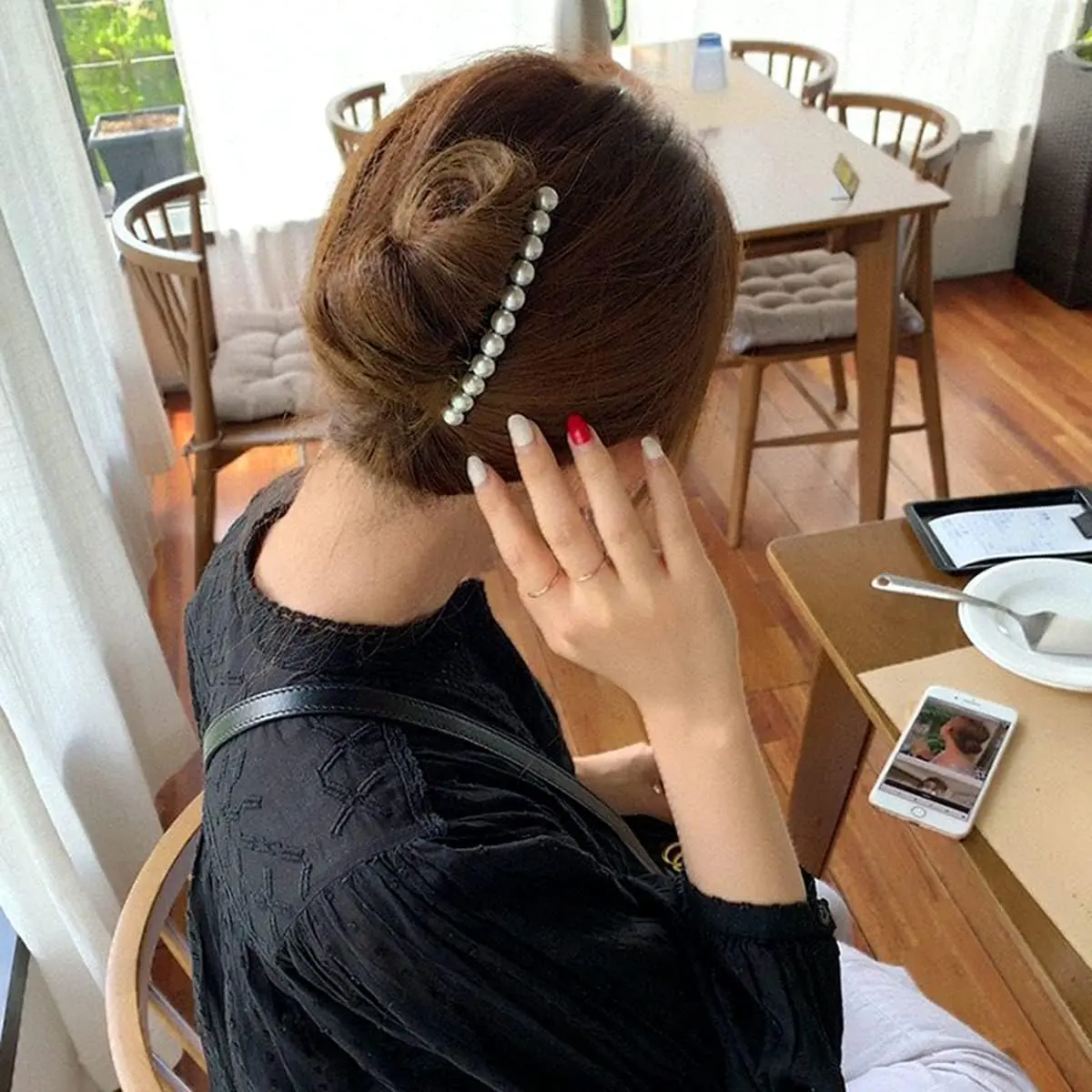 This image displays two vintage-style hair combs adorned with pearls and rhinestones, perfect for decorating hair buns and creating elegant updos for women.