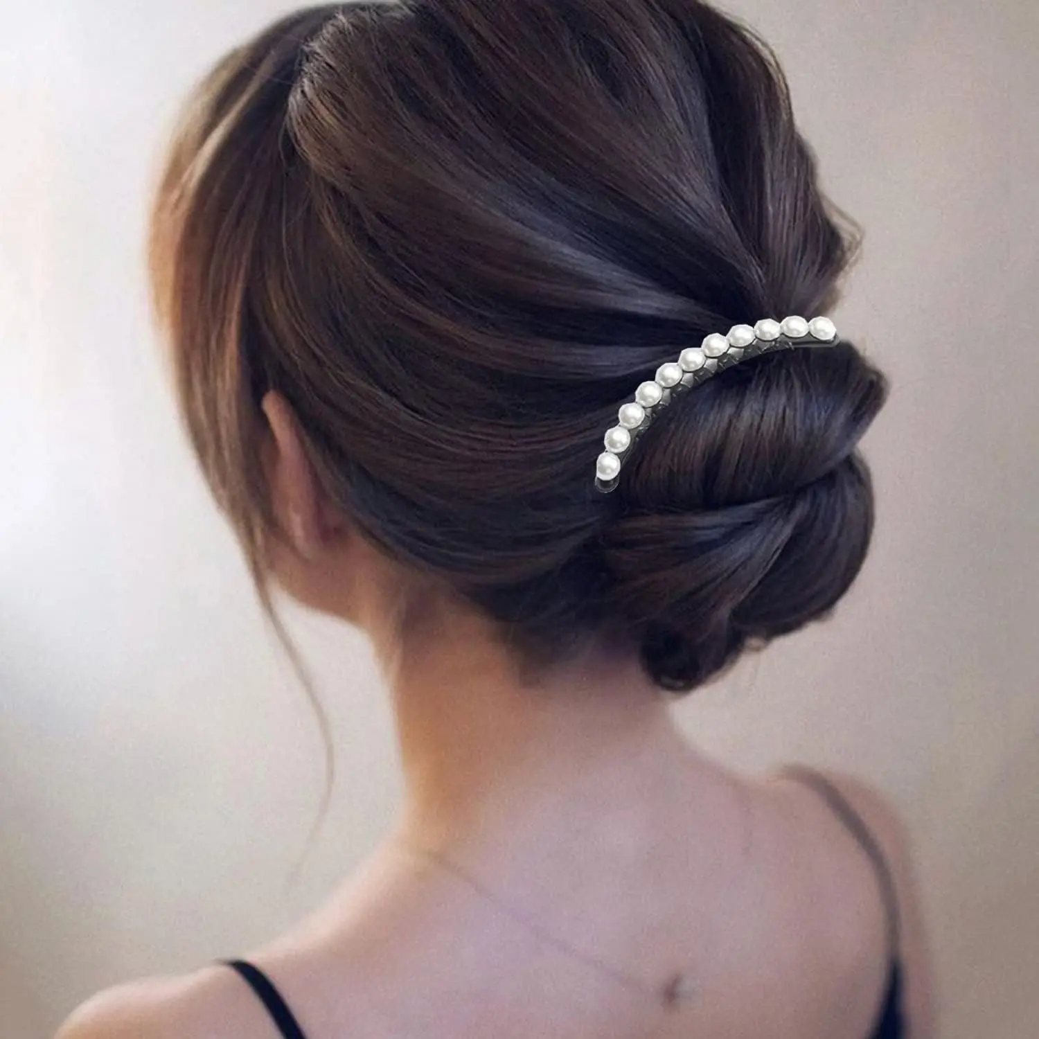 This image displays two vintage-style hair combs adorned with pearls and rhinestones, perfect for decorating hair buns and creating elegant updos for women.