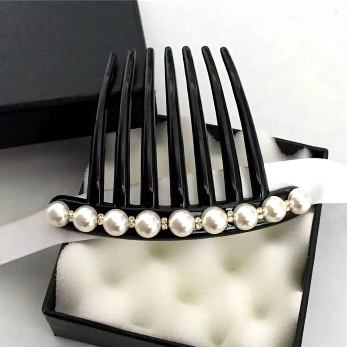 This image displays two vintage-style hair combs adorned with pearls and rhinestones, perfect for decorating hair buns and creating elegant updos for women.