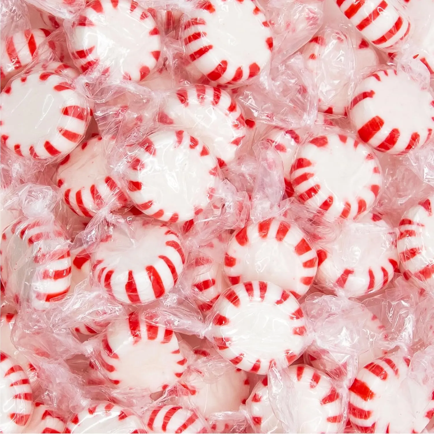 A two-pound bulk pack of red and white striped Starlight Peppermint Mints hard candy, individually wrapped and perfect for holiday treats.