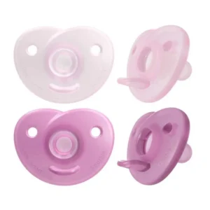 Two light pink and raspberry pink Philips AVENT soothers designed for babies 0-6 months, featuring a unique silicone design to develop natural absorbency, used by medical professionals and ideal for premature babies.