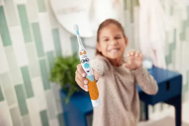 Philips Sonicare Kids Electric Toothbrush Pet Edition helps children brush for the dentist-recommended two minutes, featuring customizable stickers and gentle sonic cleaning action.