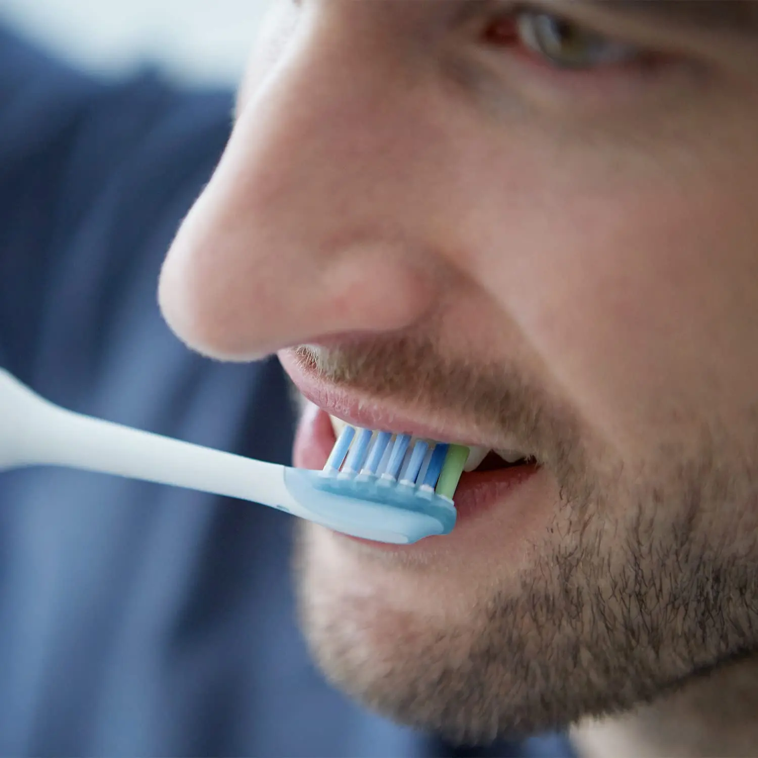 A pack of two genuine Philips Sonicare electric toothbrush replacement brush heads in white, designed for premium plaque removal and improved gum health.