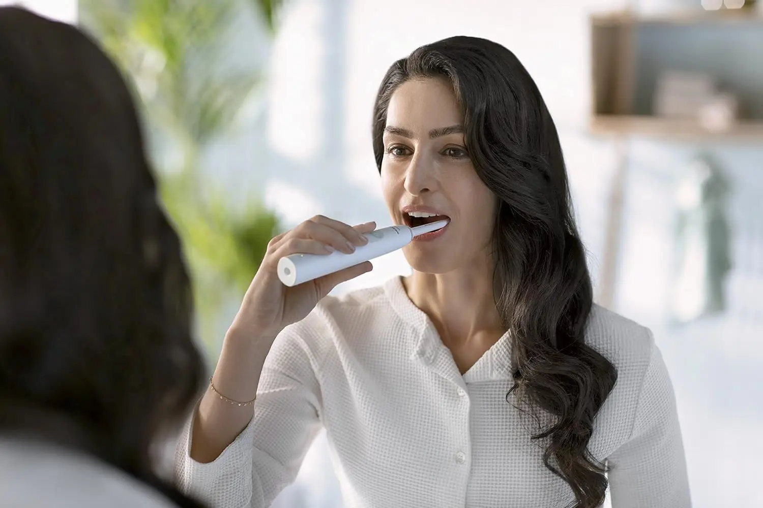 Philips Sonicare rechargeable electric toothbrush in white provides superior plaque removal for a gentle and effective clean that protects your gums.