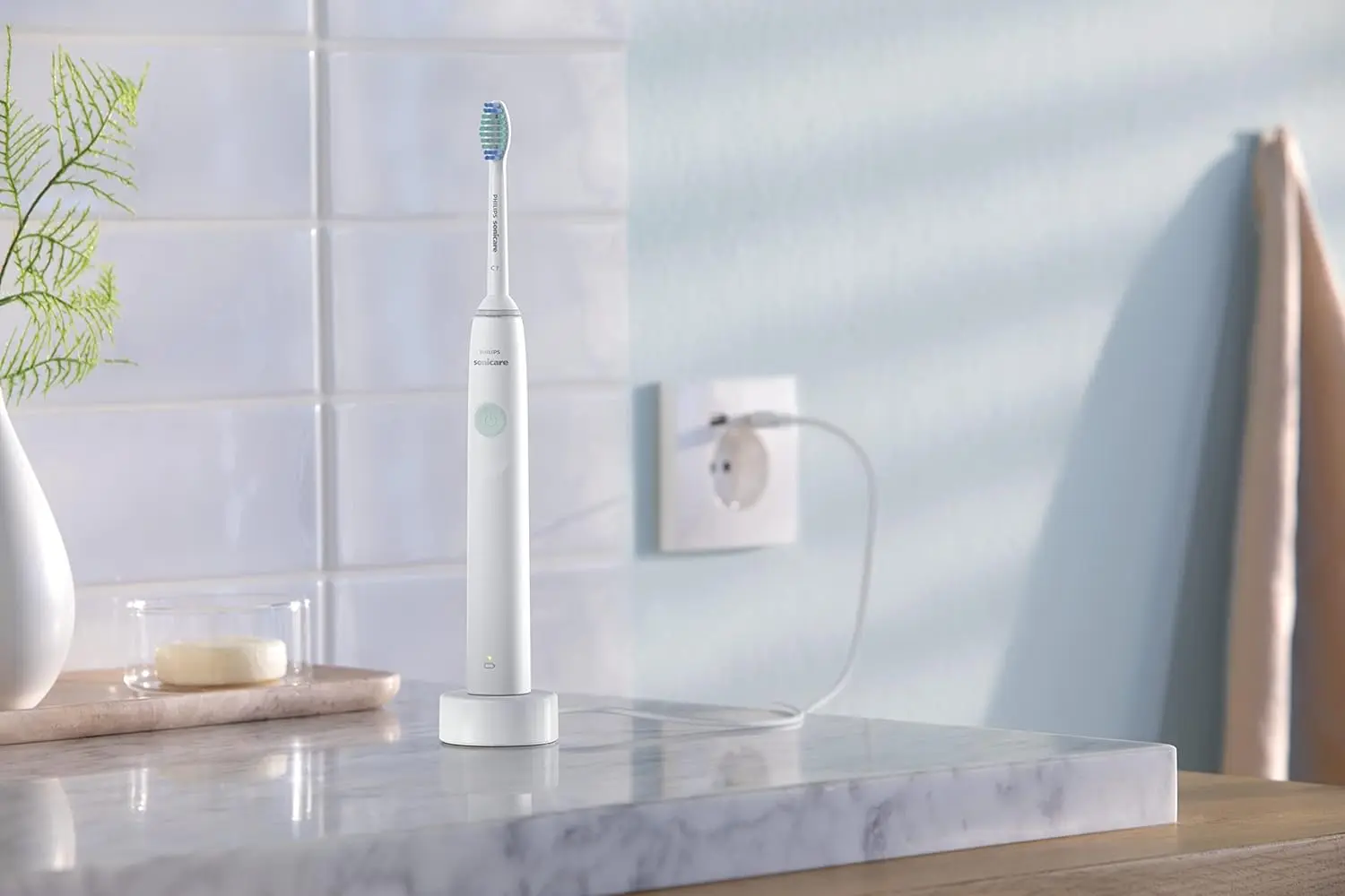 Philips Sonicare rechargeable electric toothbrush in white provides superior plaque removal for a gentle and effective clean that protects your gums.