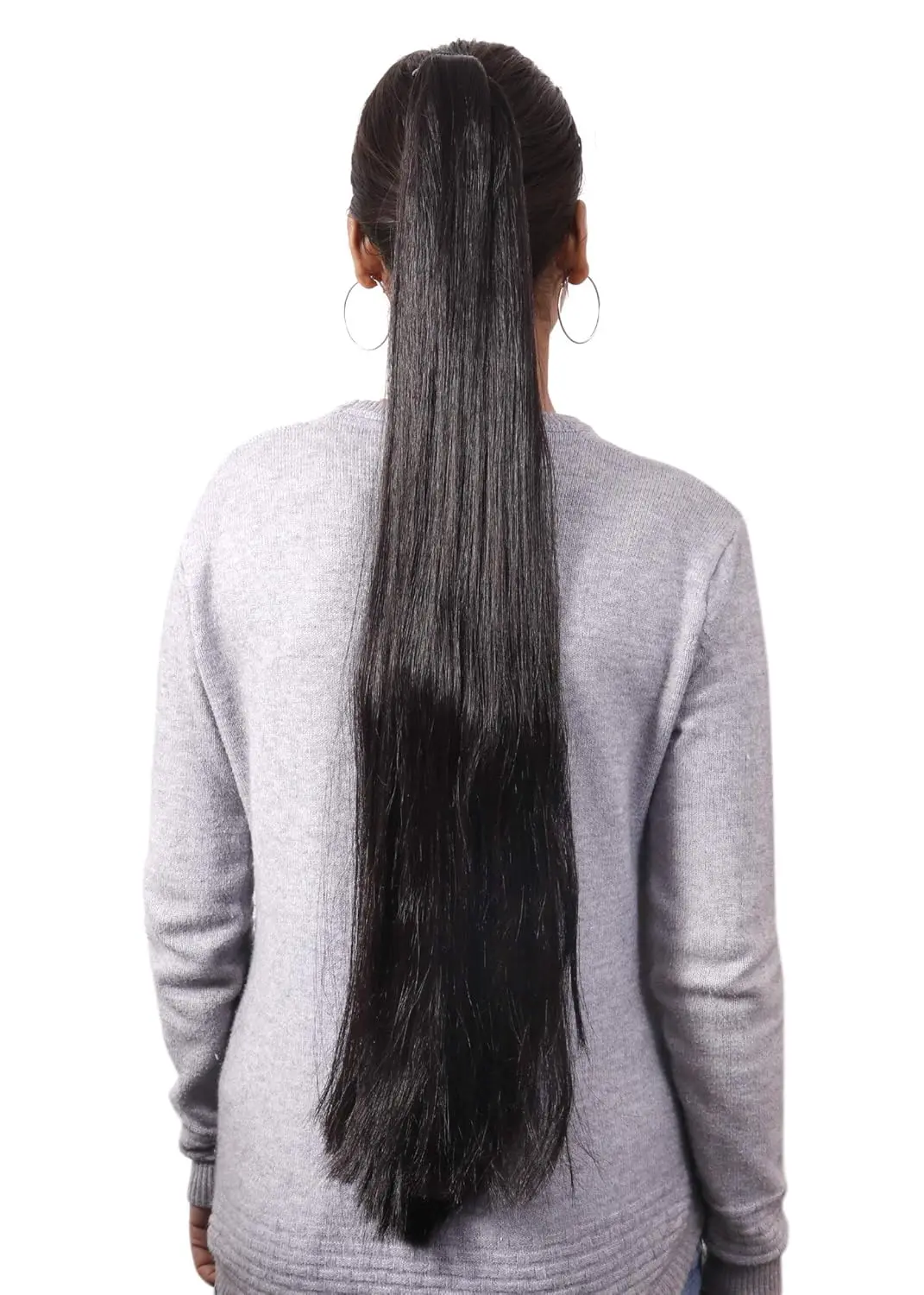 This long, black ponytail extension wig for women and girls is made of synthetic hair and looks and feels like real hair.