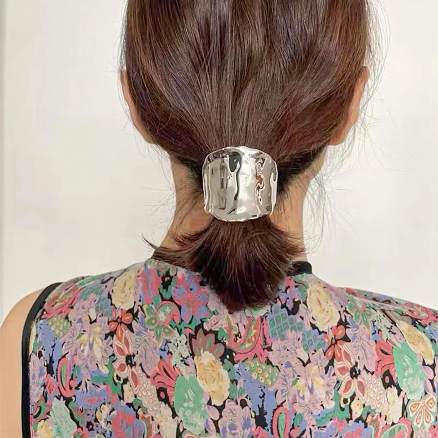 Two French-style metal ponytail holder hair clips in gold and silver, perfect for creating elegant and simple hairstyles for women and girls.