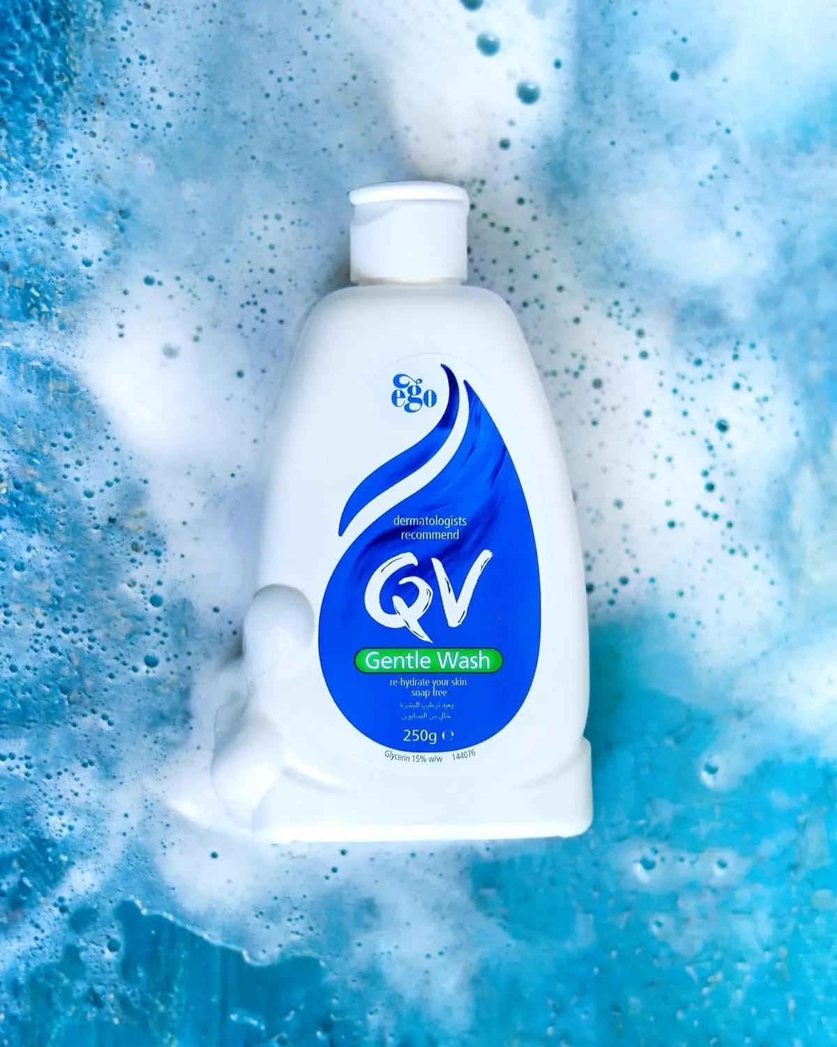 A bottle of QV Gentle Wash, a soap-free and fragrance-free body wash formulated for hydrating and cleansing dry, sensitive skin without stripping its natural oils.