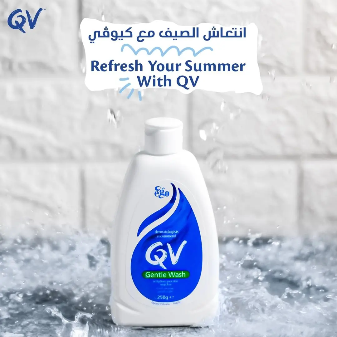 A bottle of QV Gentle Wash, a soap-free and fragrance-free body wash formulated for hydrating and cleansing dry, sensitive skin without stripping its natural oils.