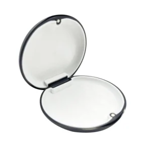 Black orthodontic retainer case with a silicone liner designed to hold aligners, dentures, mouth guards, or other oral appliances.
