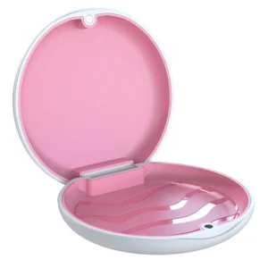 White and rose red retainer case securely holds aligners and mouth guards for protective storage while travelling.