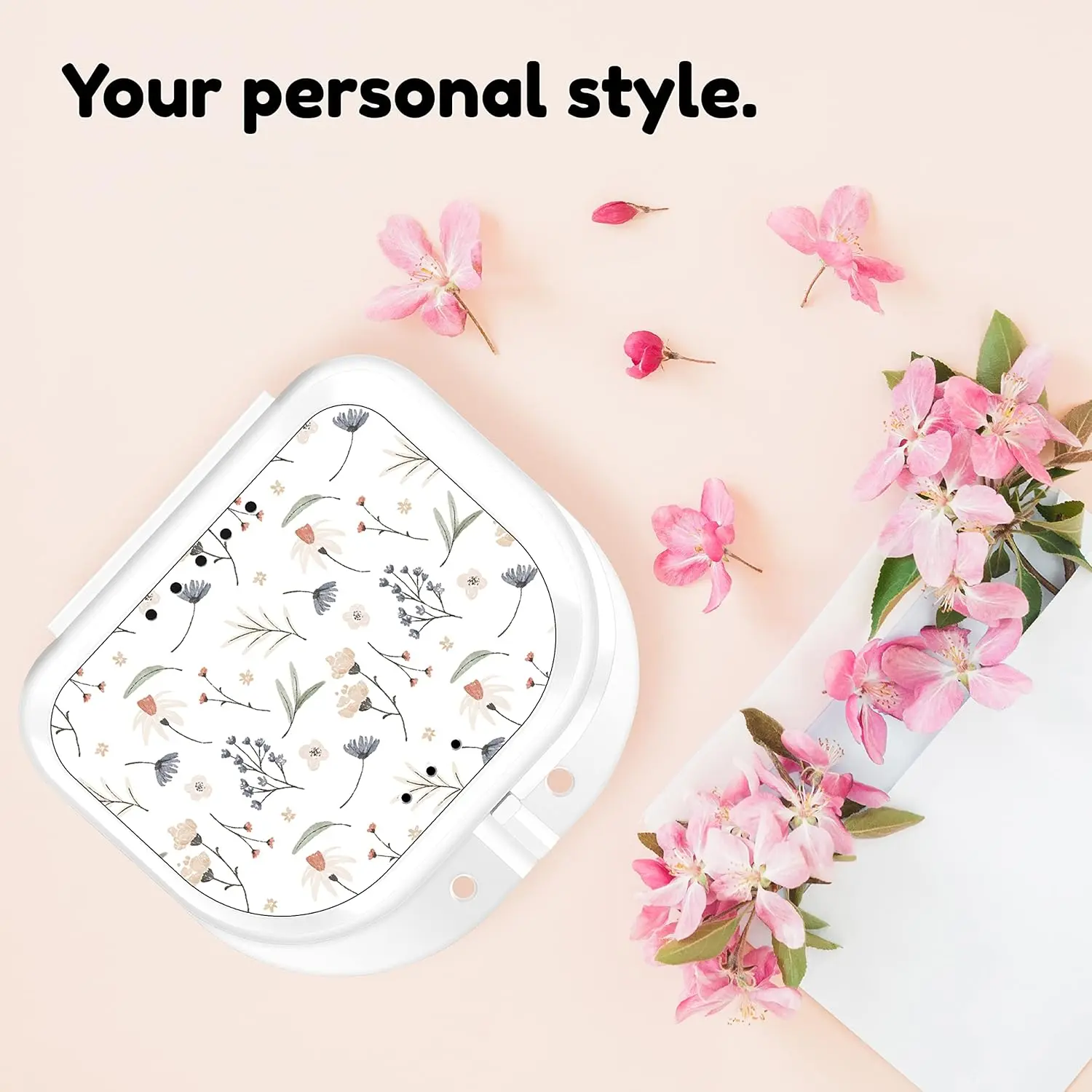 This white retainer case features a cute floral design, offering a durable and elegant way to store your mouthguard or night guard at home or while traveling.