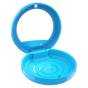 This blue BVN retainer case features a built-in mirror for easy aligner adjustments and provides safe, hygienic storage for mouth guards and other orthodontic appliances.