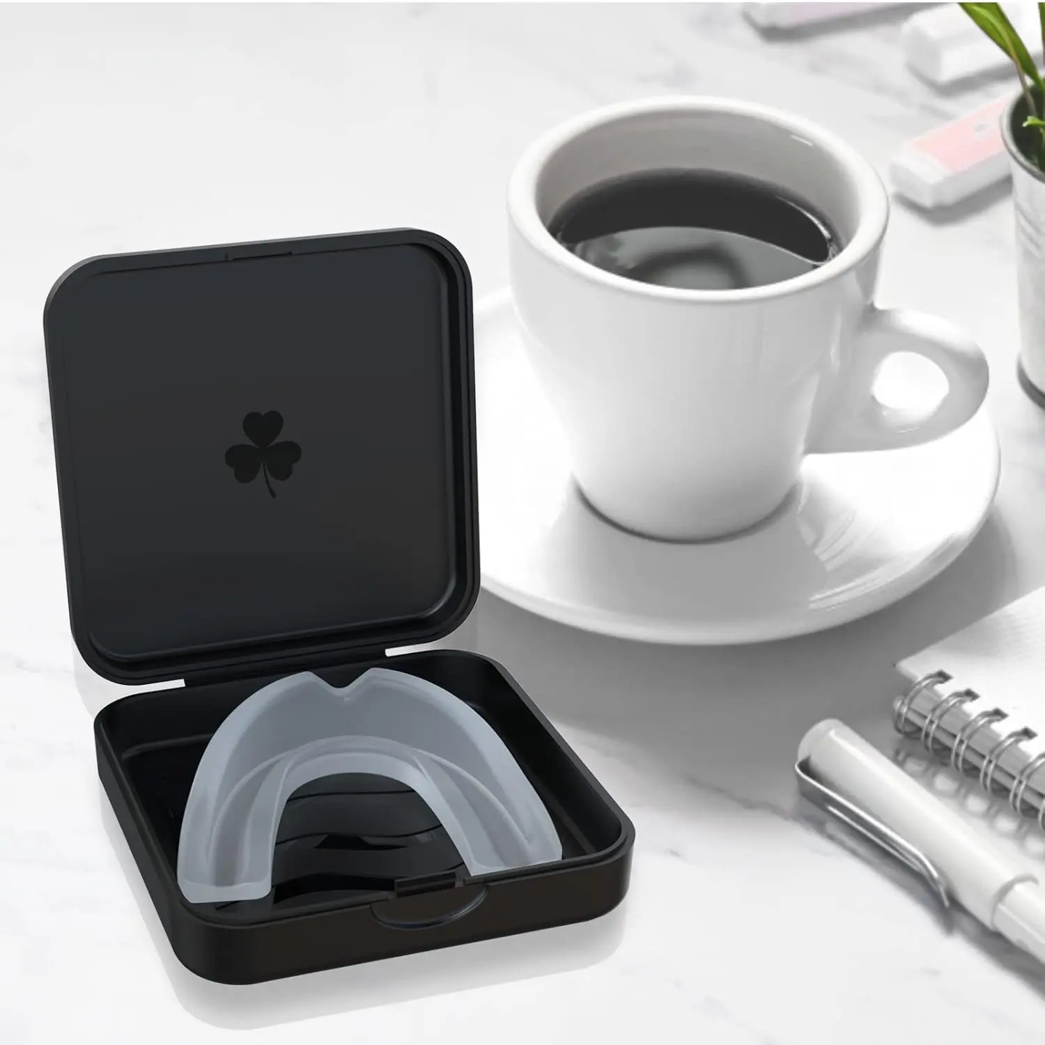 This 2 pack of black retainer cases securely stores aligners and mouthguards in a slim, portable design that's easy to clean.