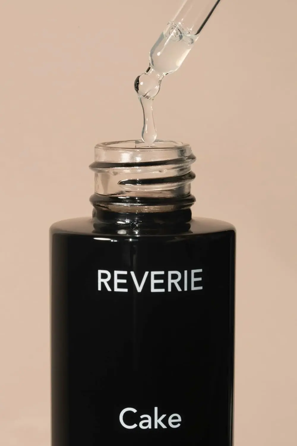 Reverie Cake hair treatment serum restores, smoothes, and protects hair and scalp with apple stem cells and essential oils.