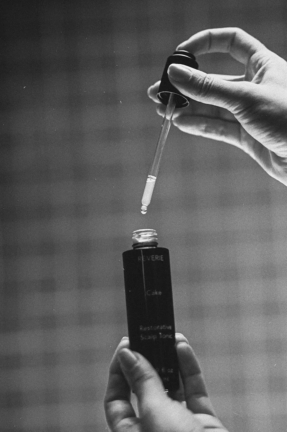 Reverie Cake hair treatment serum restores, smoothes, and protects hair and scalp with apple stem cells and essential oils.